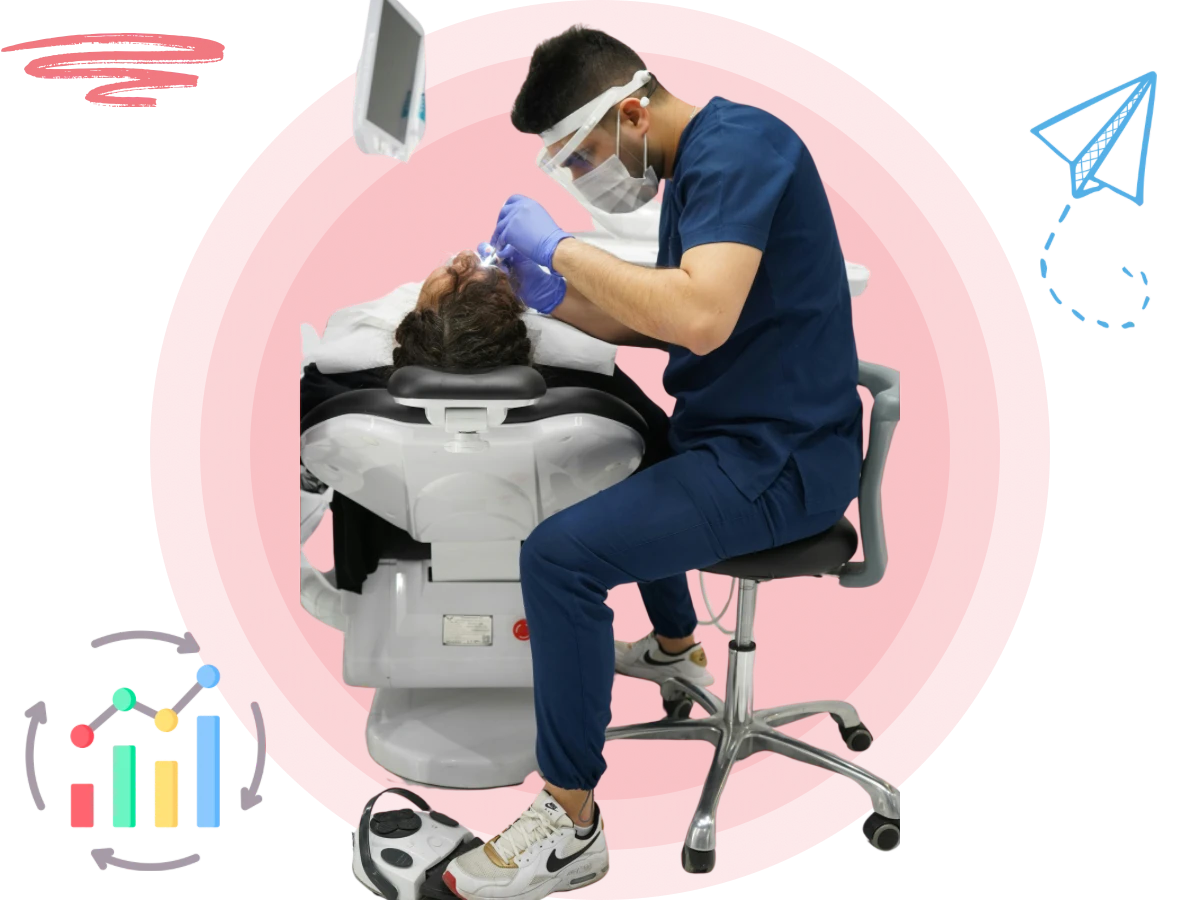 Dentist treating a patient during a routine dental exam in a Texas practice